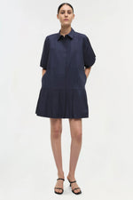 Load image into Gallery viewer, Simkhai Crissy Midnight poplin mini dress with relaxed puffed fit, balloon short sleeves, and front button closure
