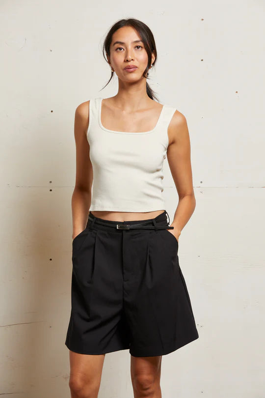 White luxe rib tank top with clean binded edges, wide bra-friendly straps, and a close-fitting silhouette that hits at the natural waist.