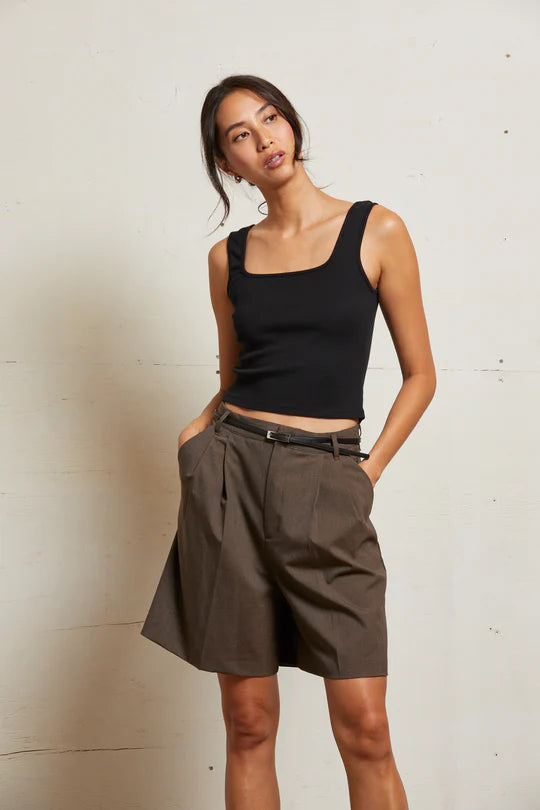 Black luxe rib tank top with clean binded edges, wide bra-friendly straps, and a close-fitting silhouette that hits at the natural waist.