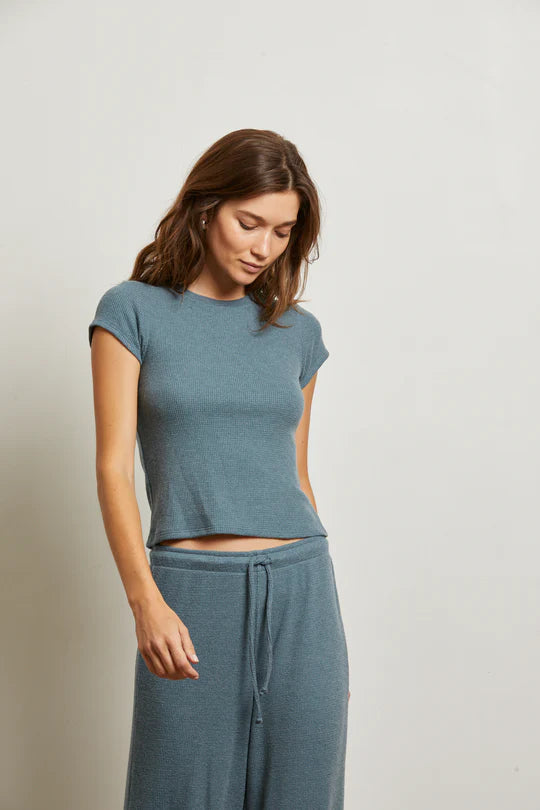 luxe  top with clean binded edges, wide bra-friendly straps, and a close-fitting silhouette that hits at the natural waist. Also available in ash color with a viscose-spandex blend.