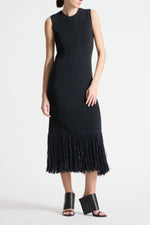 Load image into Gallery viewer, Saint Art Jovie Fringe Knit Dress in midi length with sleeveless silhouette and textured cotton fringe detailing, creating movement and dimension in a fitted knit design
