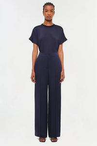 Model wearing Simkhai The Addy T-Shirt in Midnight with classic round neckline and relaxed fit