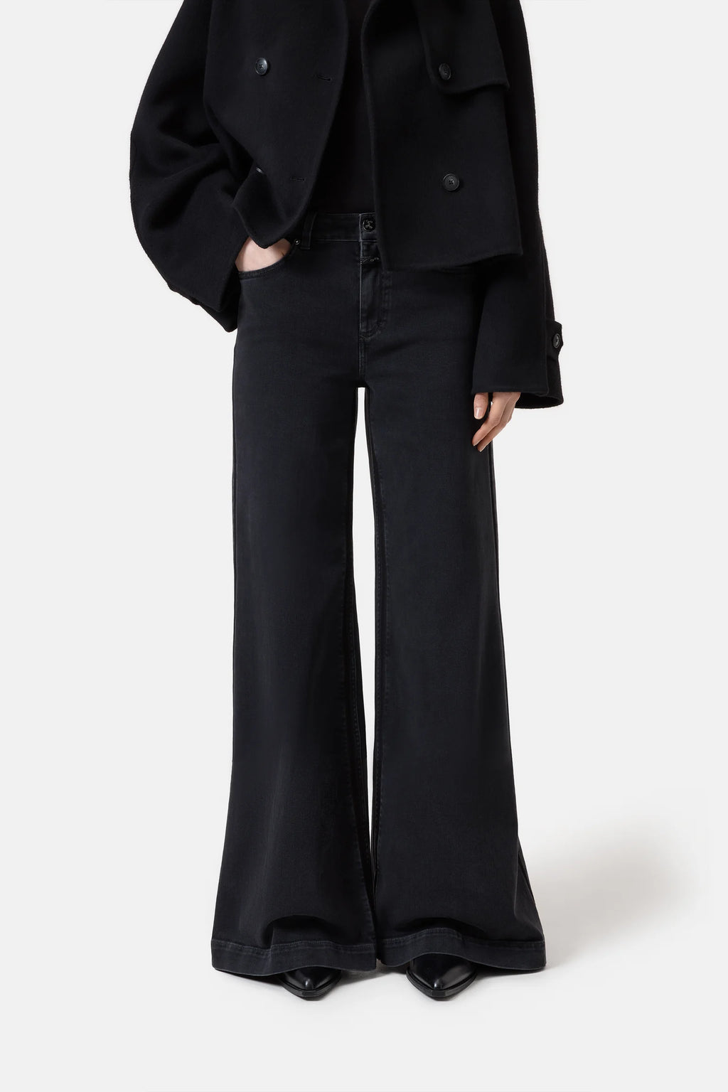 Black high-waisted wide-leg flared jeans from Closed Denim, featuring a sleek fit through the hips and thighs with a full-length flare