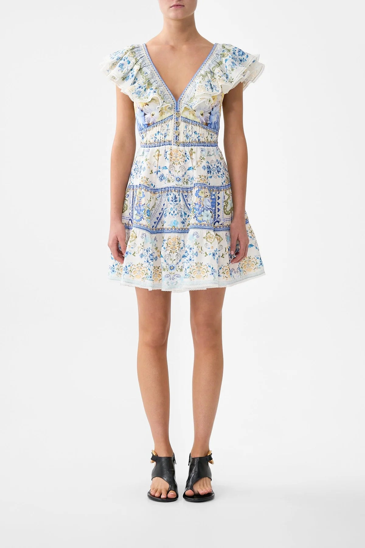 Short tiered linen dress in an exclusive homespun-inspired print, featuring a deep V buttoned neckline with a double-layer frill, fitted waist with adjustable tie back, and sparkling crystal embellishments for a romantic, feminine finish.