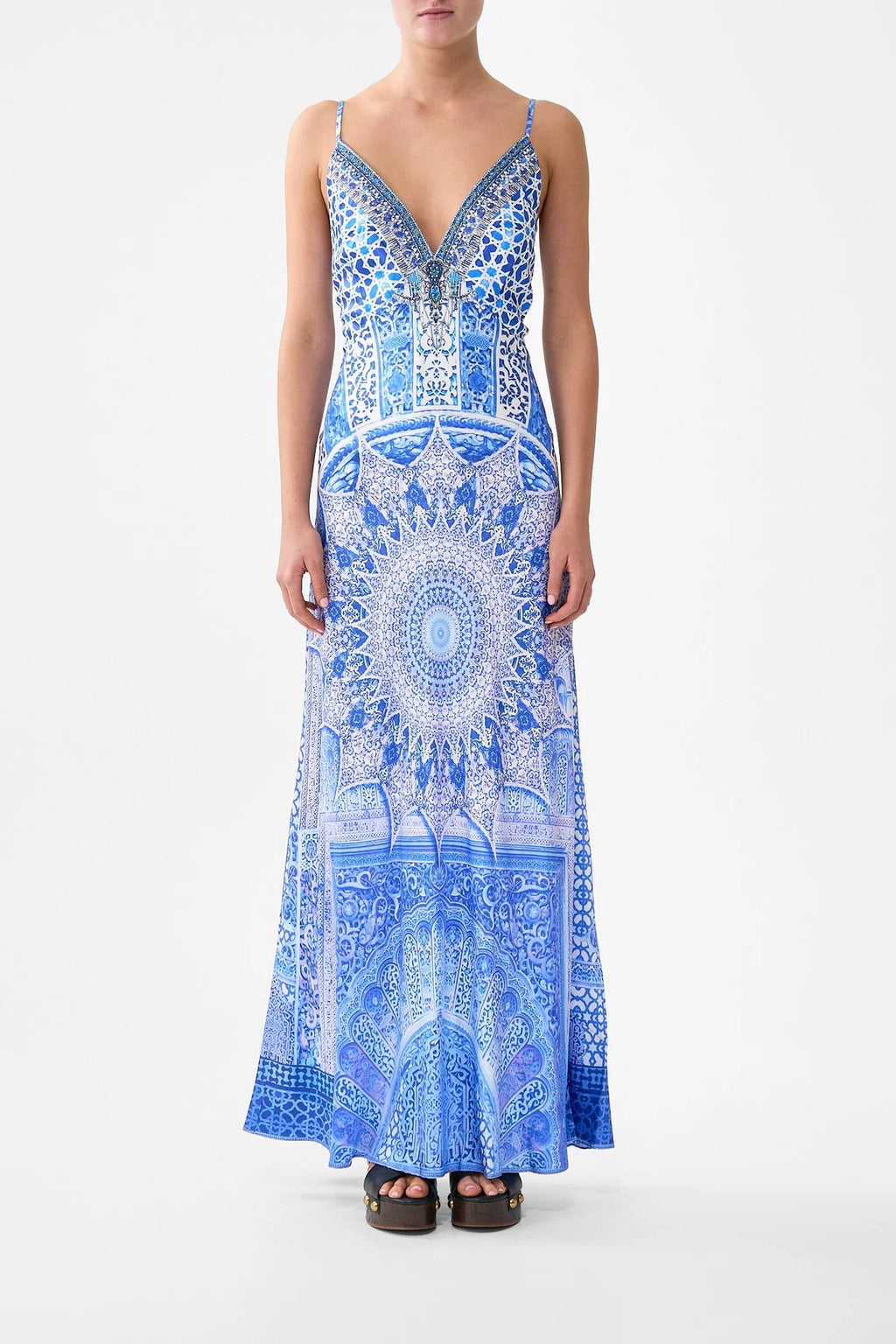 Full-length silk bias-cut slip dress with a deep V-neck and low back, featuring an exclusive homespun-inspired print, adjustable straps, and delicate crystal embellishments that add a luminous touch.