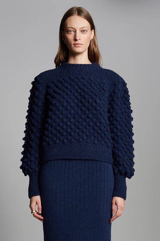 Eleven Six Camila Sweater in ivory air-spun alpaca blend with allover popcorn stitch, blouson sleeves, ribbed mock neck, cuffs, and hem, handmade in Peru.