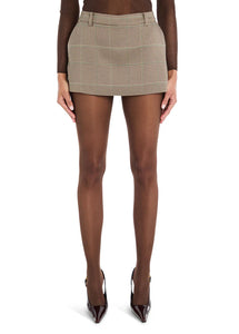 Ser.O.Ya Plaid Mini Skort in British Plaid, featuring belt loops and a side zipper for a tailored fit. Perfectly paired with the Jennifer Blazer for a stylish and sophisticated look