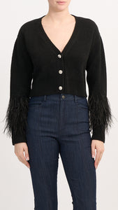 Cropped V-neck cardigan with button front, heather knit body, and dramatic feather-trimmed cuffs, made from soft stretch acrylic blend.