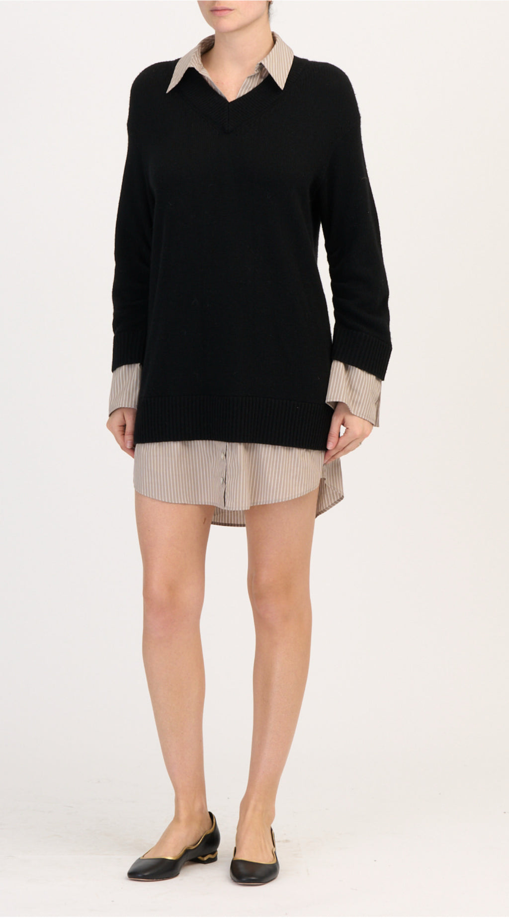 Women’s layered sweater dress with heather knit pullover top and built-in white button-down shirt hem, long sleeves, and ribbed cuffs.