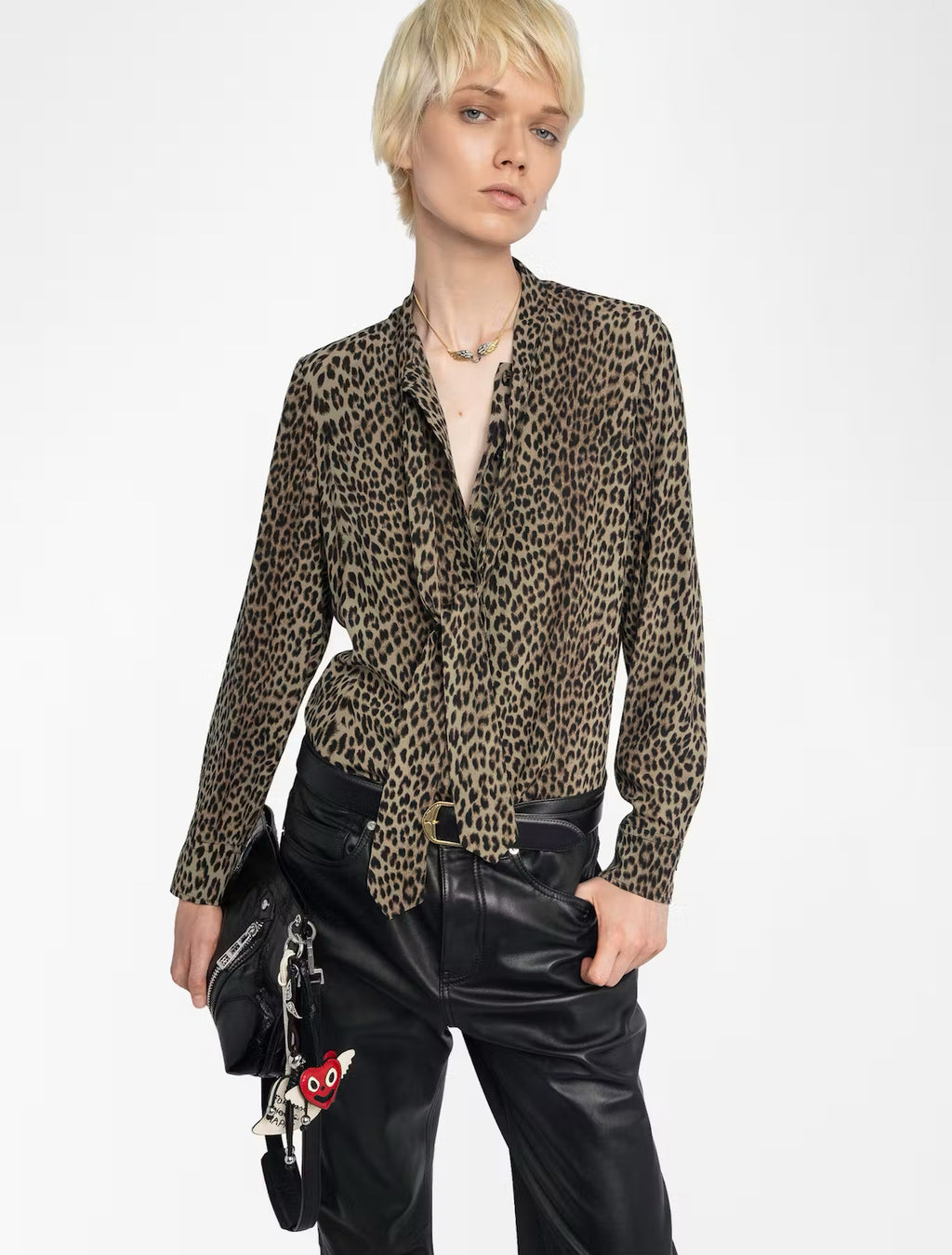 Zadig & Voltaire Tulba women’s satin leopard print blouse with pussy-bow collar, long sleeves, button closure, and rhinestone wing embroidery on back.
