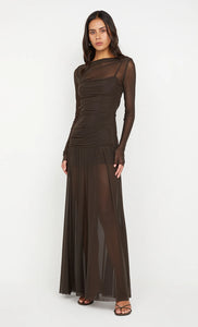 Model wearing the Bec + Bridge Blaine long sleeve maxi dress in a sleek, body-hugging silhouette with full-length sleeves and minimalist design