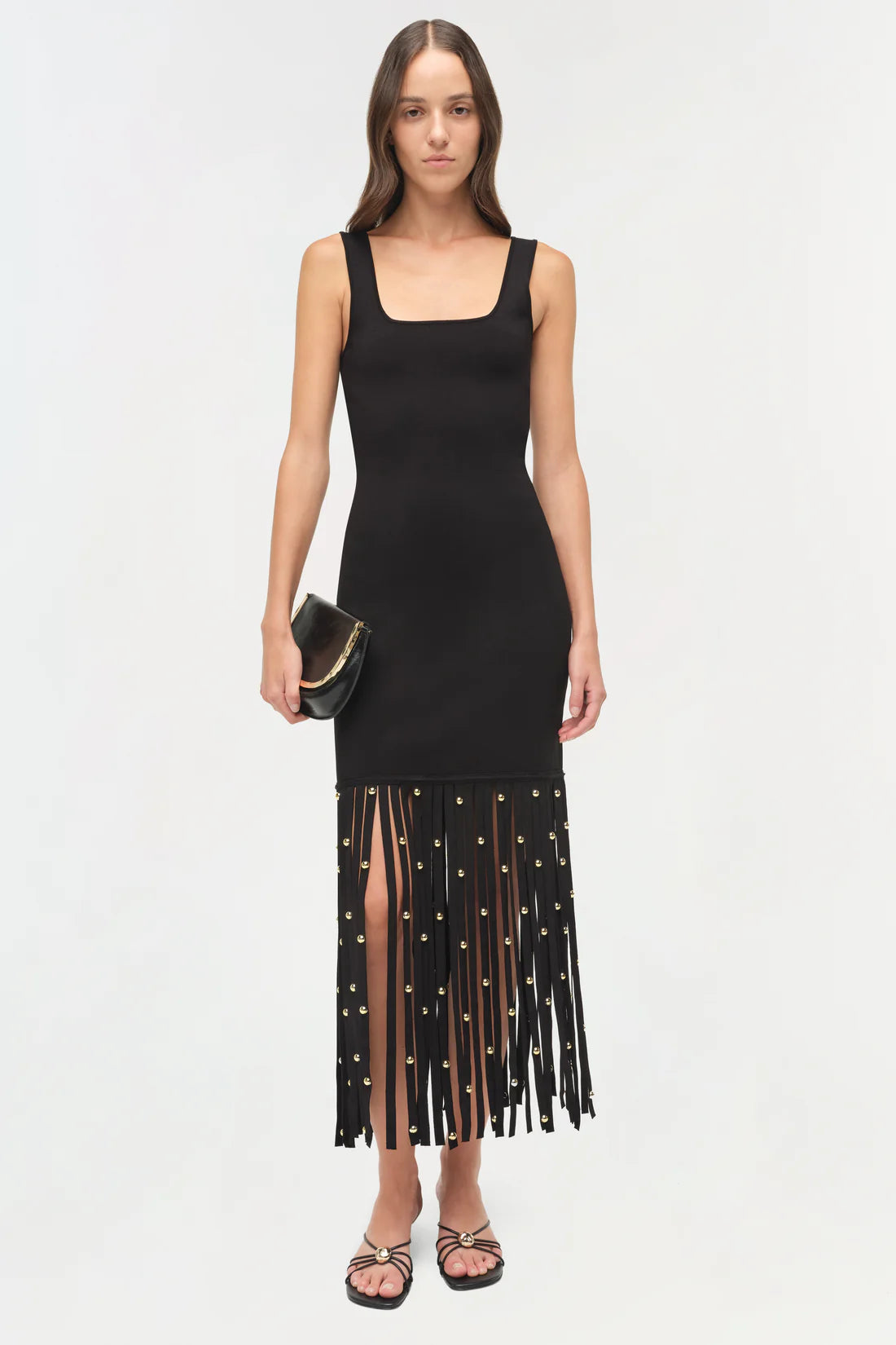 Simkhai Romania Knit Dress in matte compact weave featuring a square neckline, fitted midi silhouette, and cascading fringe with metal hardware detailing.