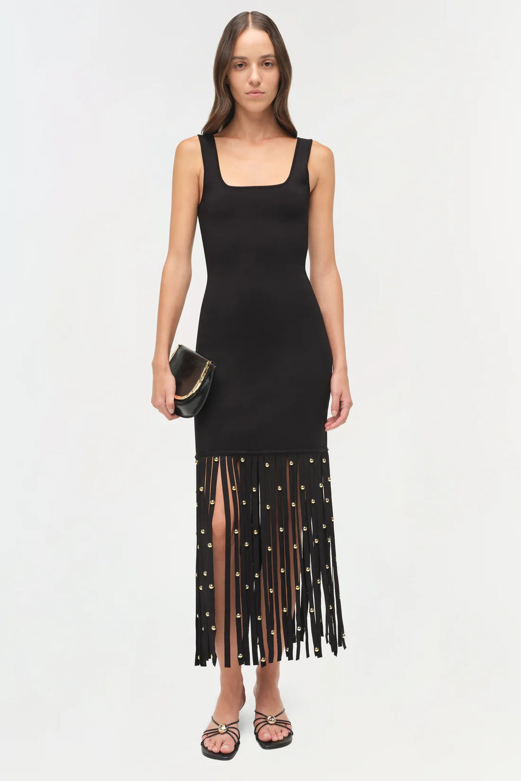 Simkhai Romania Knit Dress in matte compact weave featuring a square neckline, fitted midi silhouette, and cascading fringe with metal hardware detailing.