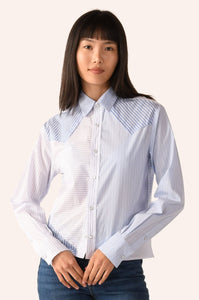 Wear CISSA Scrappy Shirt – upcycled Western shirt with pearl snap buttons and scalloped yoke"

"Model wearing Scrappy Shirt by Wear CISSA made from 100% Egyptian cotton and fabric scraps"

"Close-up of raw edge detailing and pearl snaps on Wear CISSA Scrappy Shirt"

"Back view of upcycled Scrappy Shirt featuring classic Western scalloped yoke"

"Wear CISSA sustainable Western shirt made from leftover cotton fabric scraps