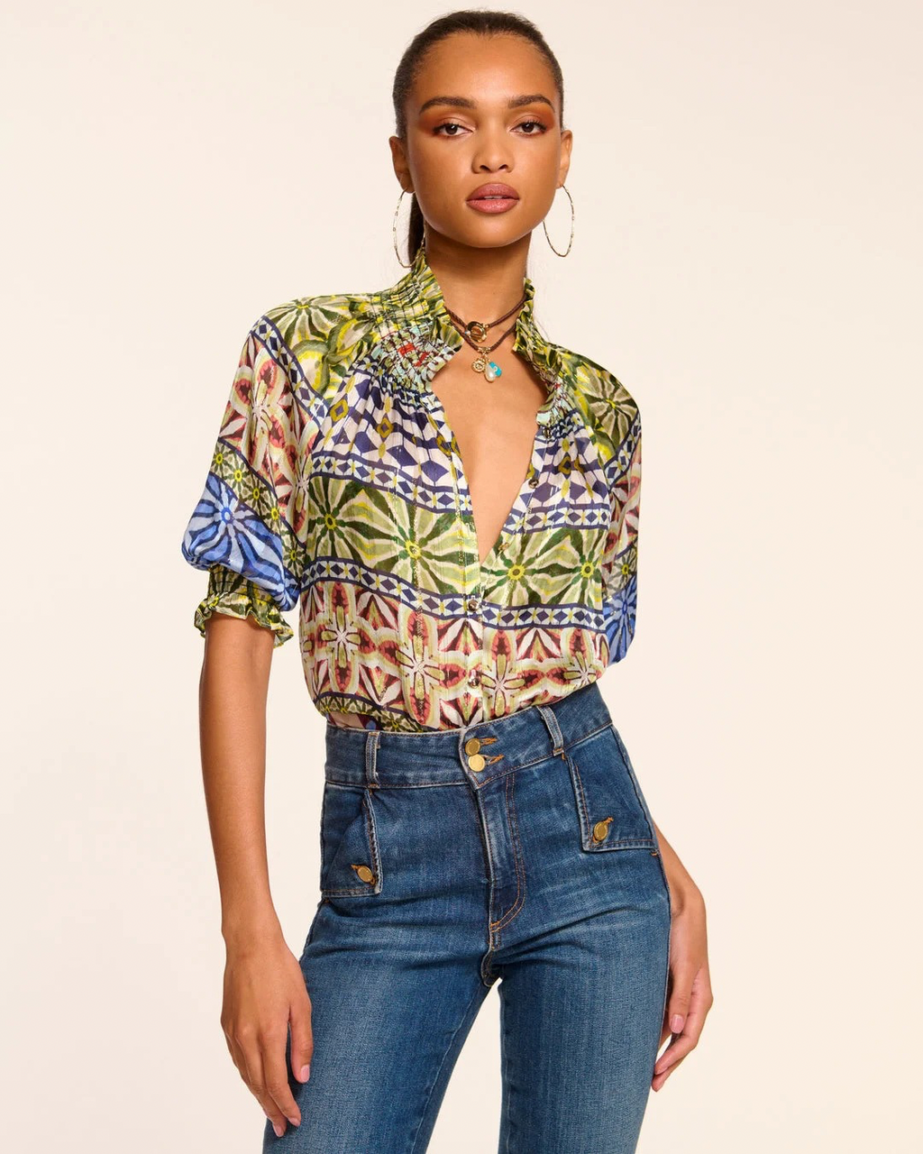 Keywords: Ramy Brook blouse, Chela blouse, silk V-neck blouse, puff sleeve blouse, short puff sleeves, button-down blouse, non-banded silhouette blouse, bra-friendly blouse, women's fashion blouse, luxury silk blouse, metallic blouse, elegant blouse, stylish blouse.